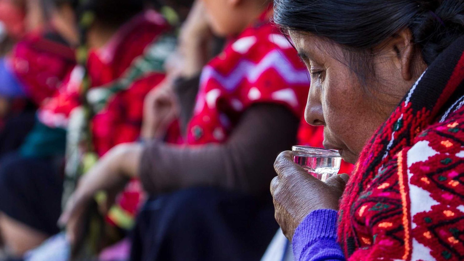 An Indigenous woman drinks pox.