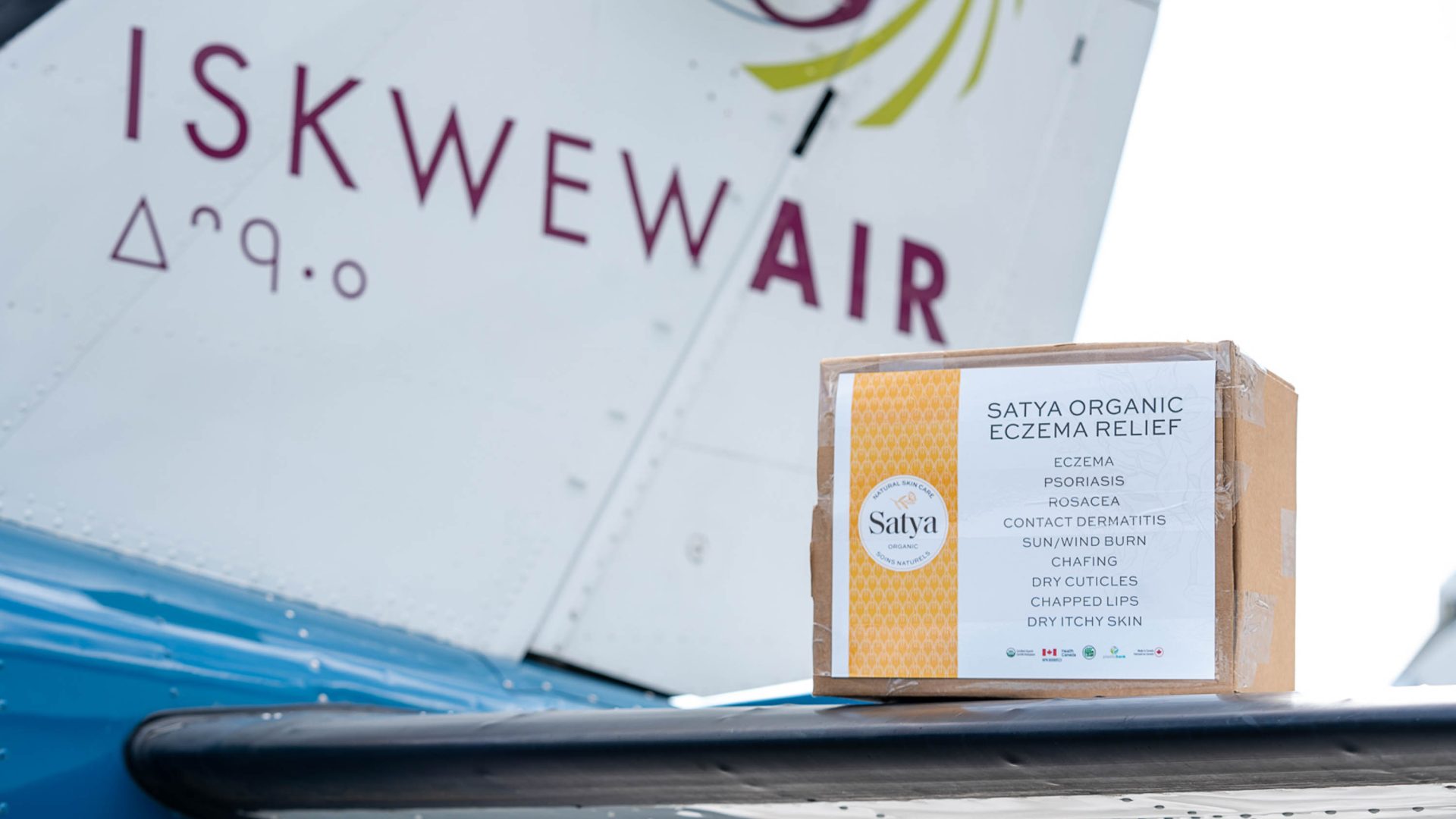 A box sits ready to be loaded onto an Iskwew Air flight.