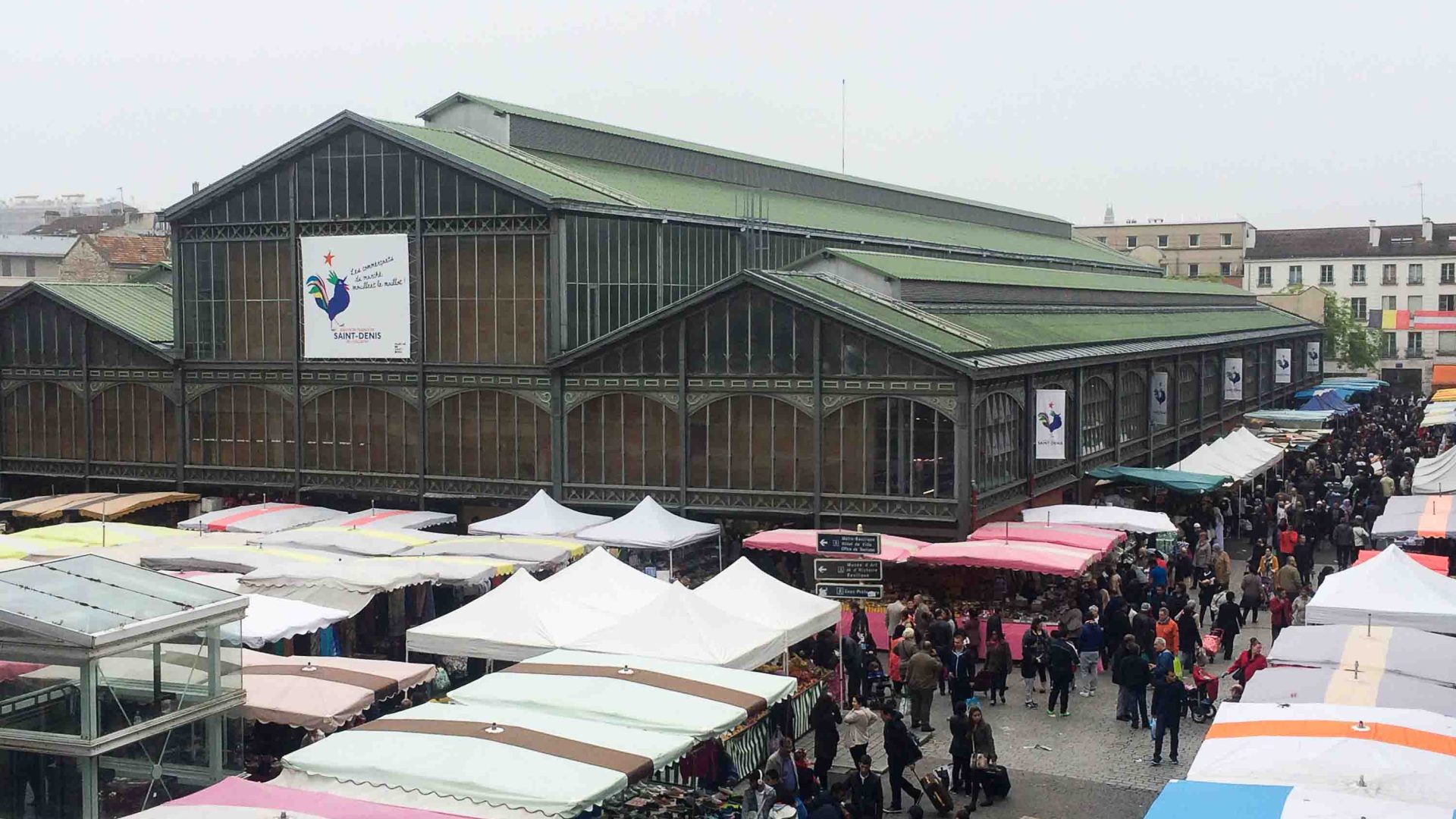 A market with a number of outdoor stalls.