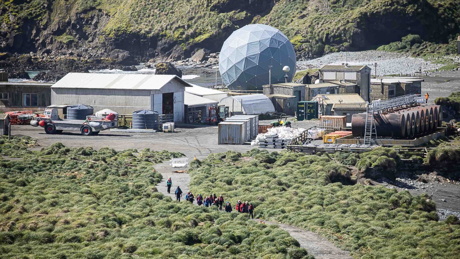 People walk toward a research centre.