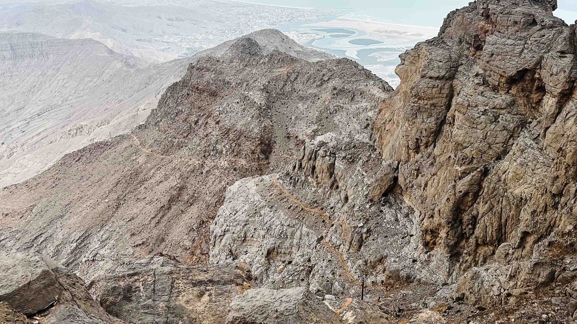 Rocky cliffs that drop down to valleys.