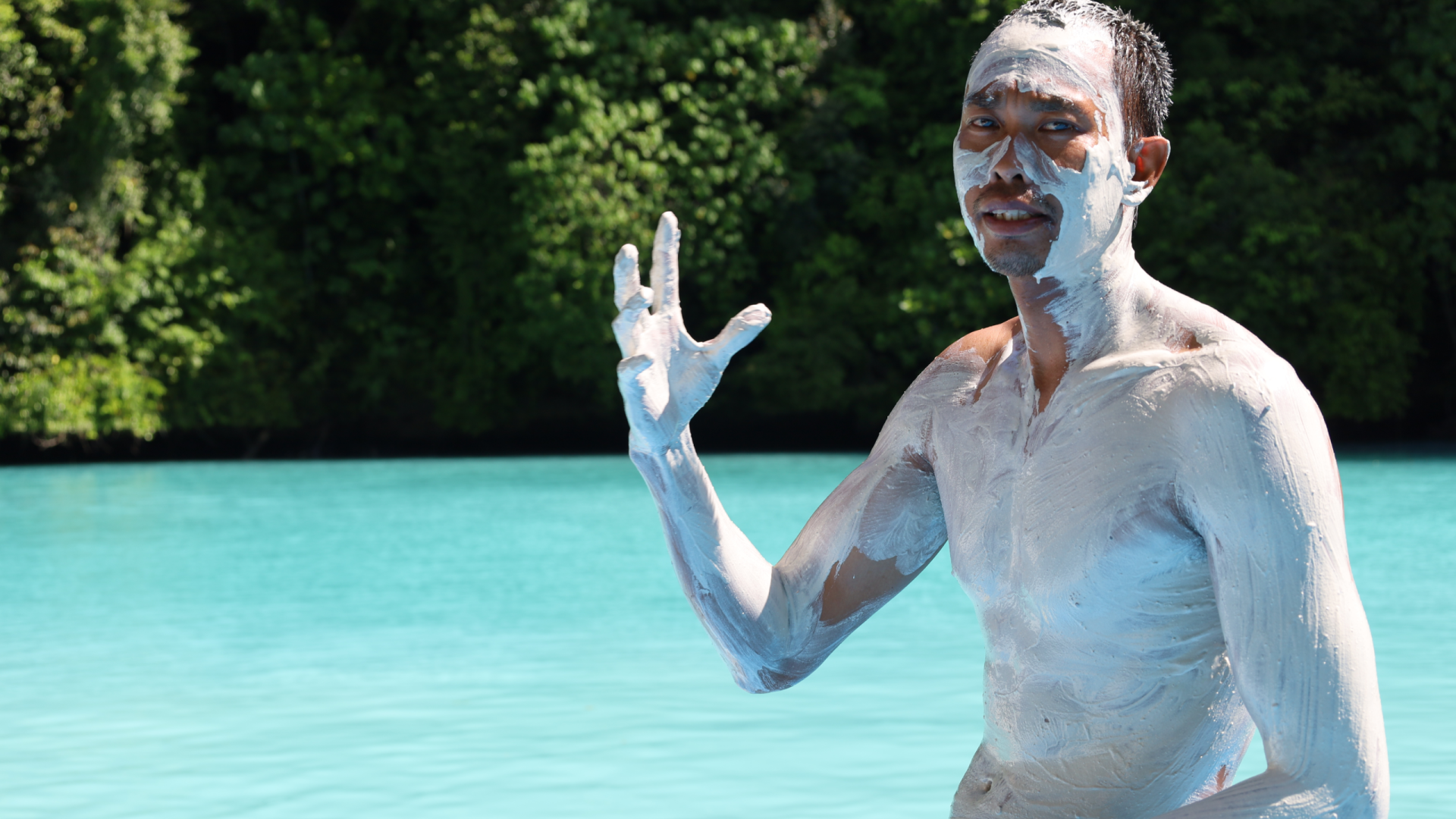 Man takes mud bath in Milky Way lagoon