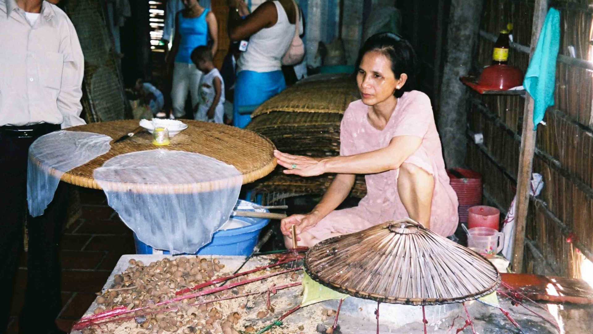 A woman prepares food.