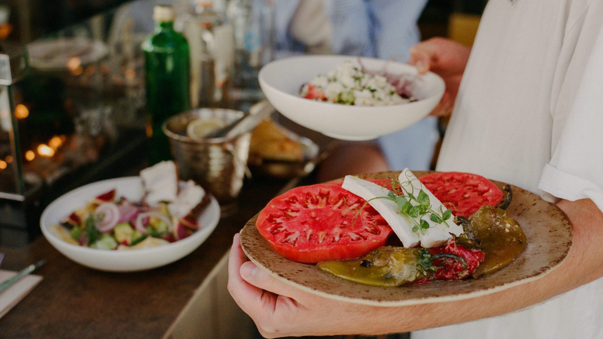 Pavaj home-grown fresh tomatoes with roasted peppers and fresh white cheese.