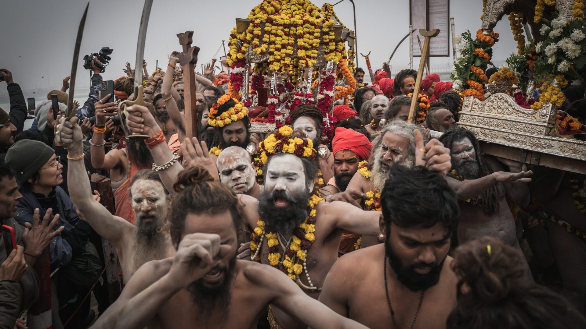 Naga sadhus (holy men) lead the procession to the royal bath