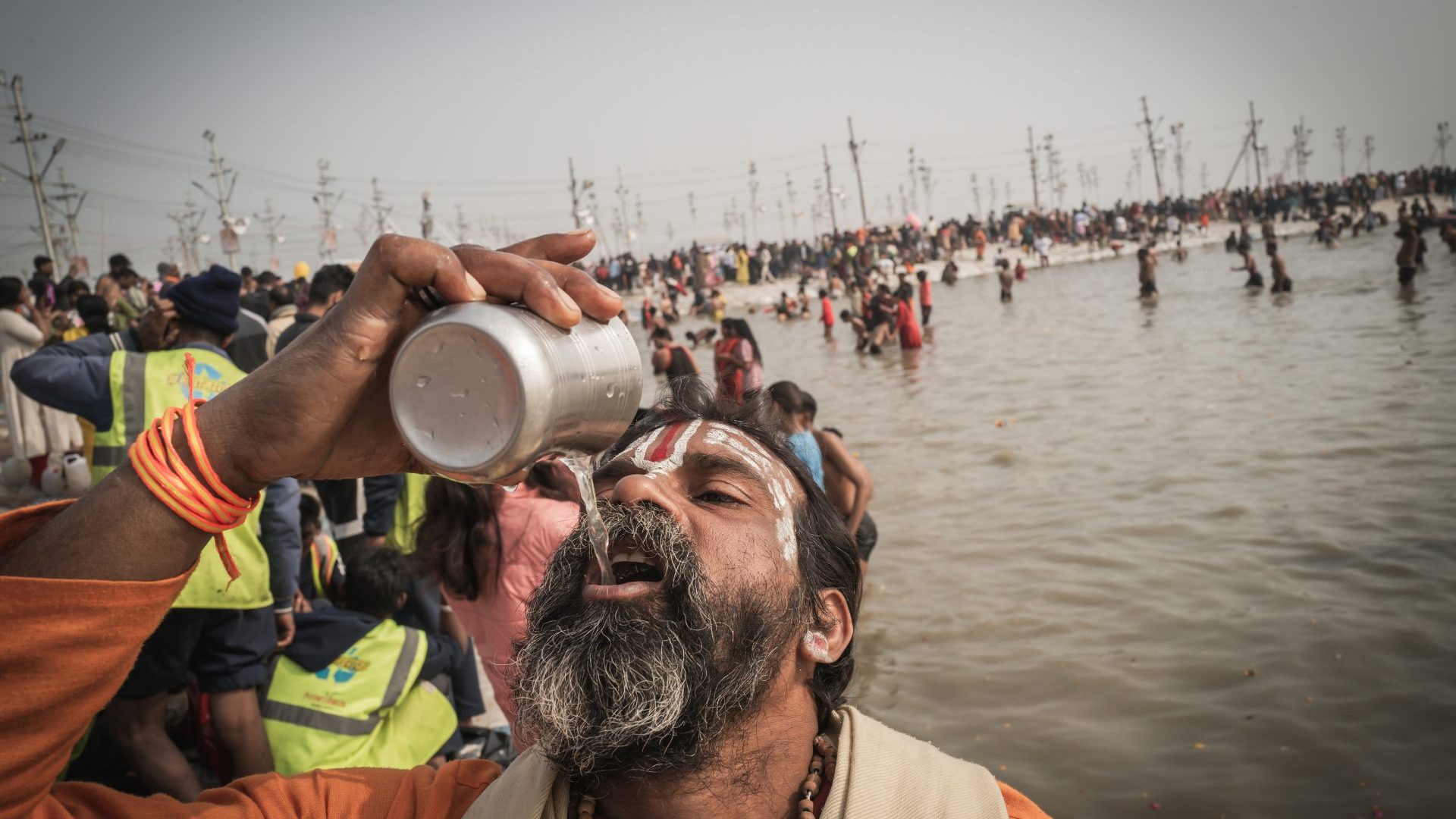 Man drinks from the holy rivers.