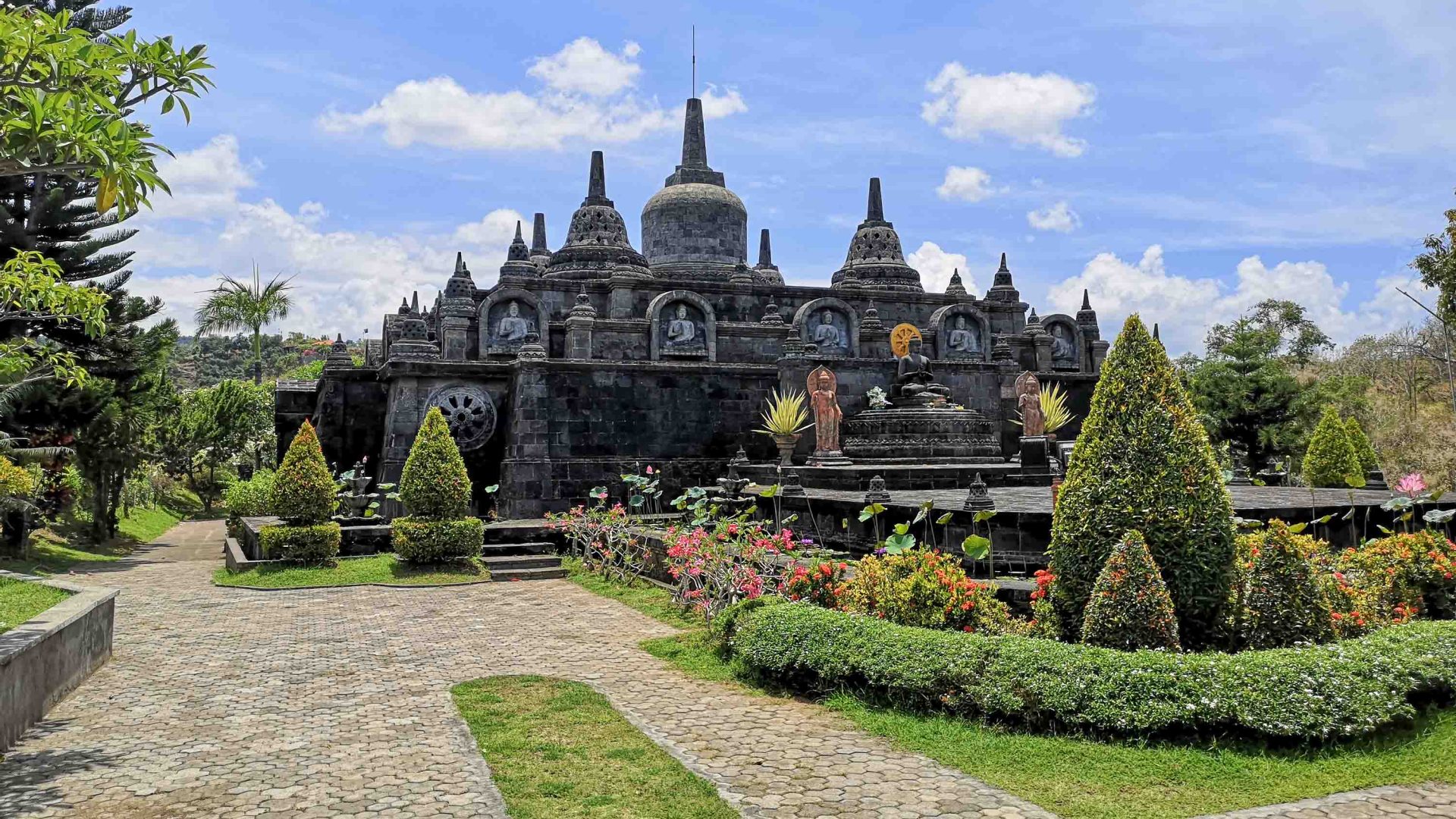 A temple in landscaped gardens.