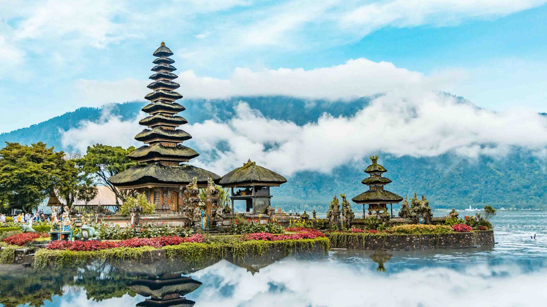 A temple on the edge of some water.