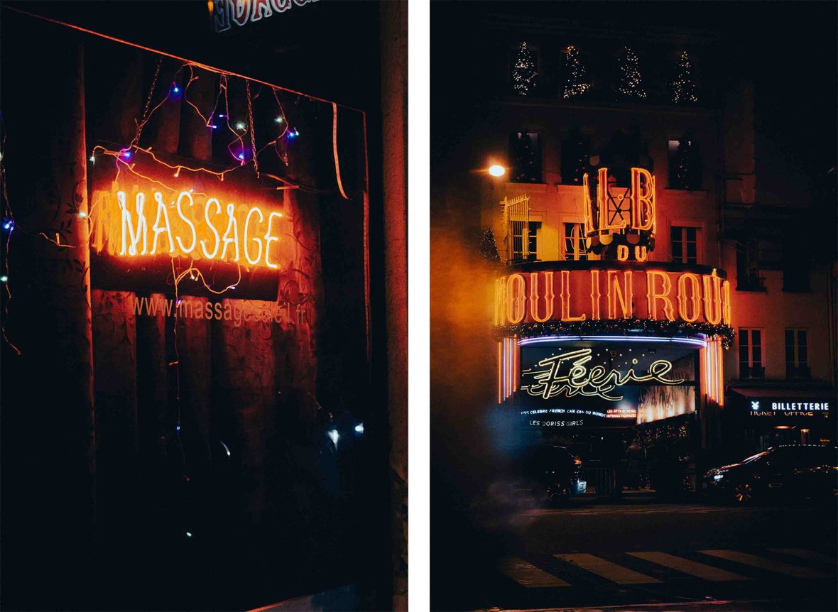 A massage sign and the exterior of Moulin Rouge.