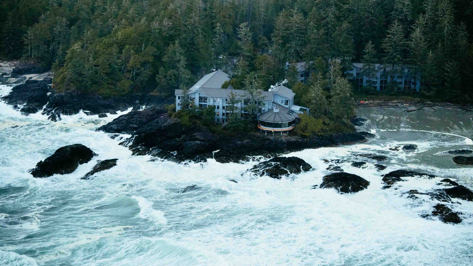 A hotel on the edge of rough seas.