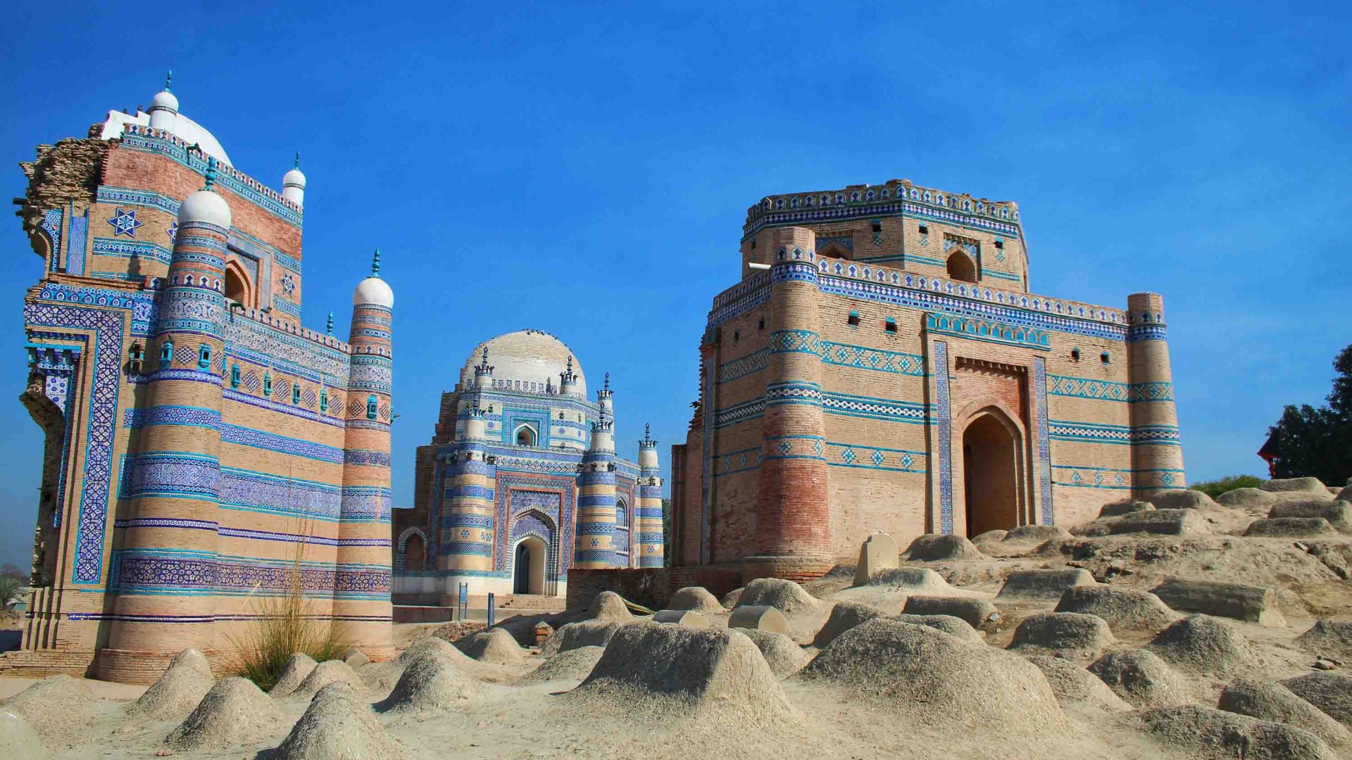 Buildings with domes and arches have blue and orange lines on them.