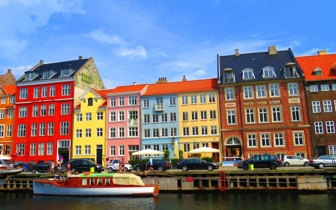 Brightly colored houses line the canals of Copenhagen