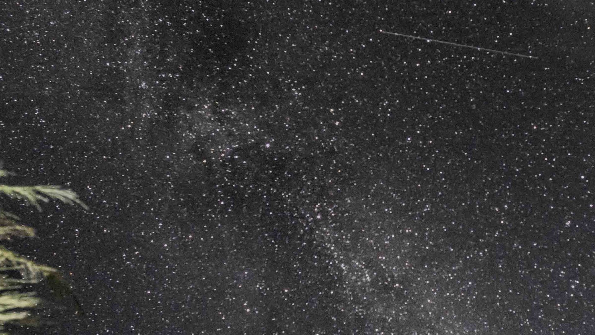 The night sky with stars, including a couple of shooting stars.