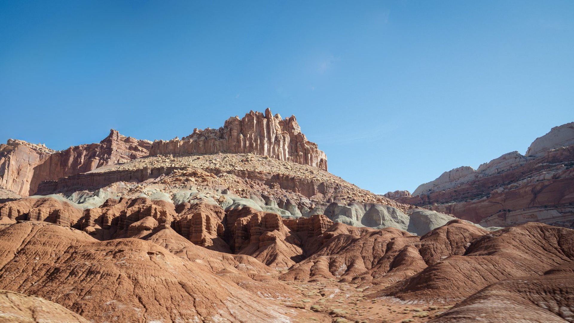 Red rock landscape beneath blue sky