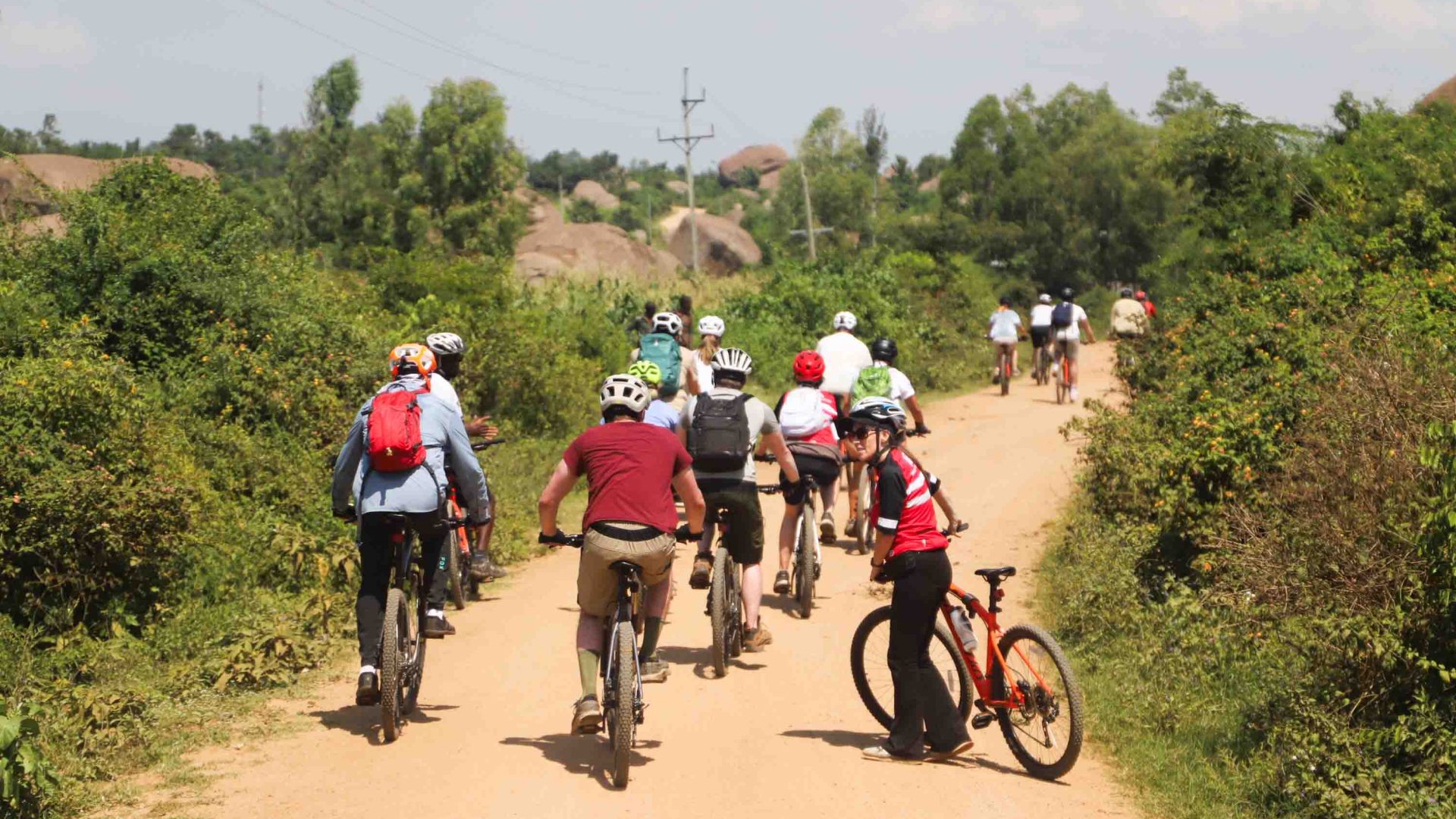 Riders on a dusty road.