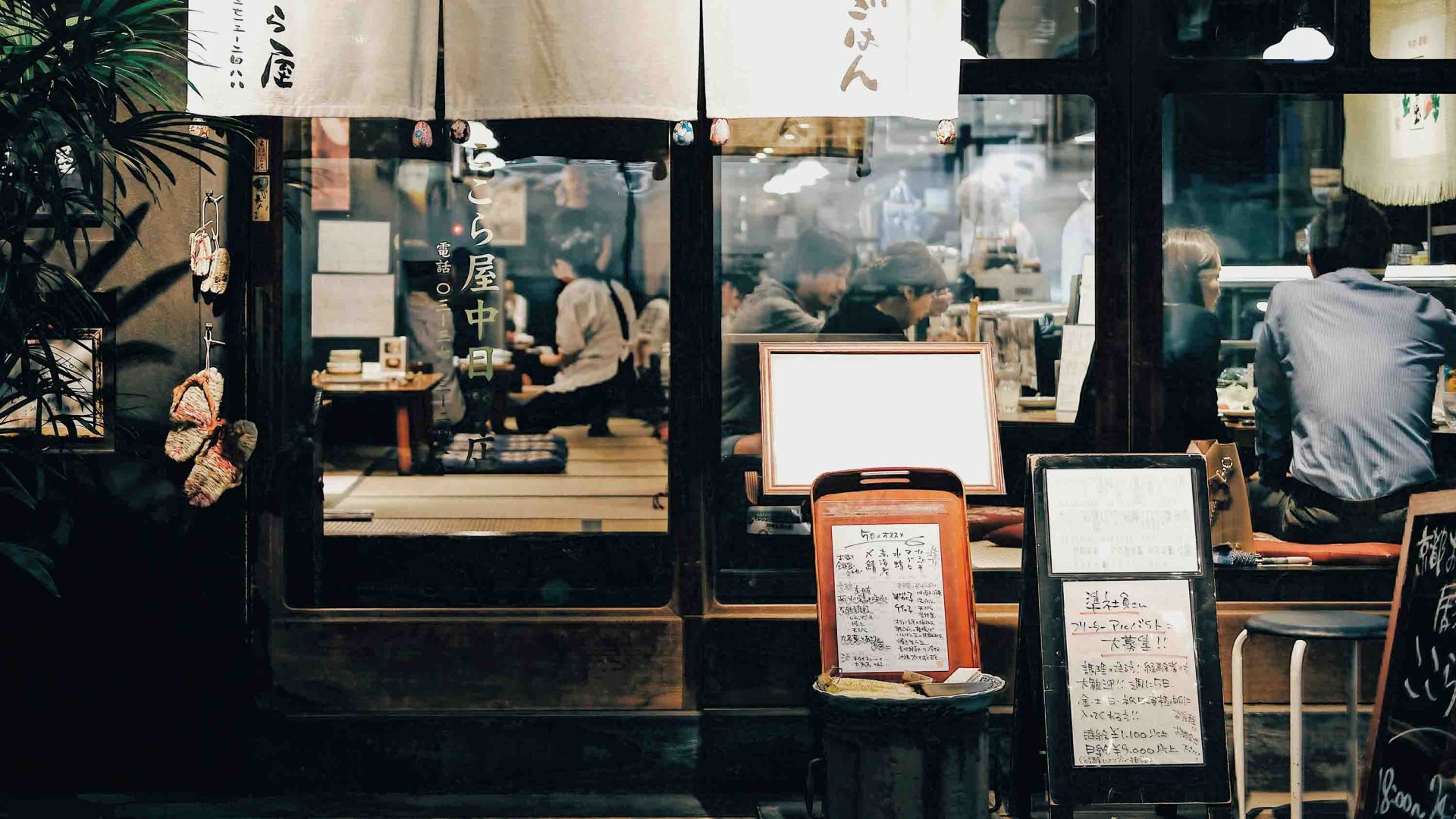 People eating at a Japanese restaurant.