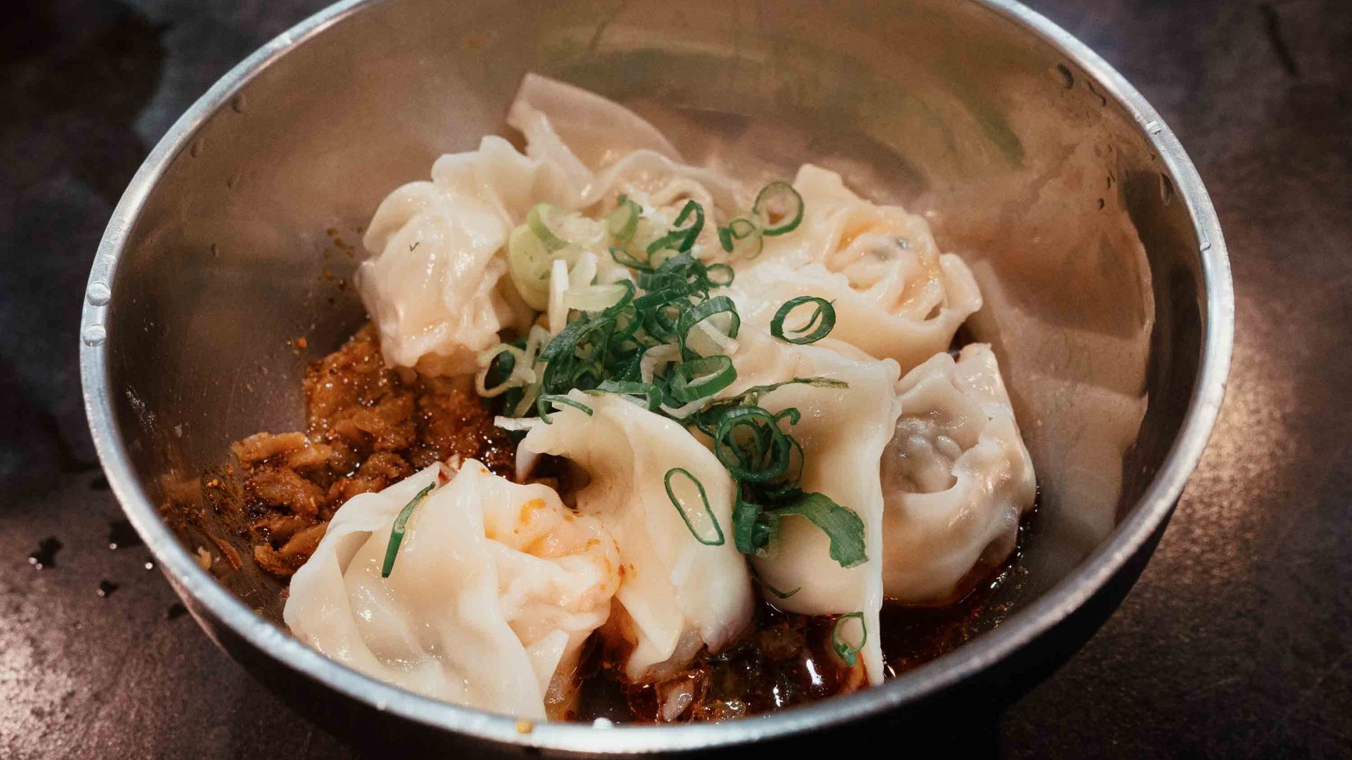 A plate of steamed wontons.