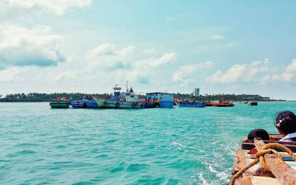 Fishing boats on blue water