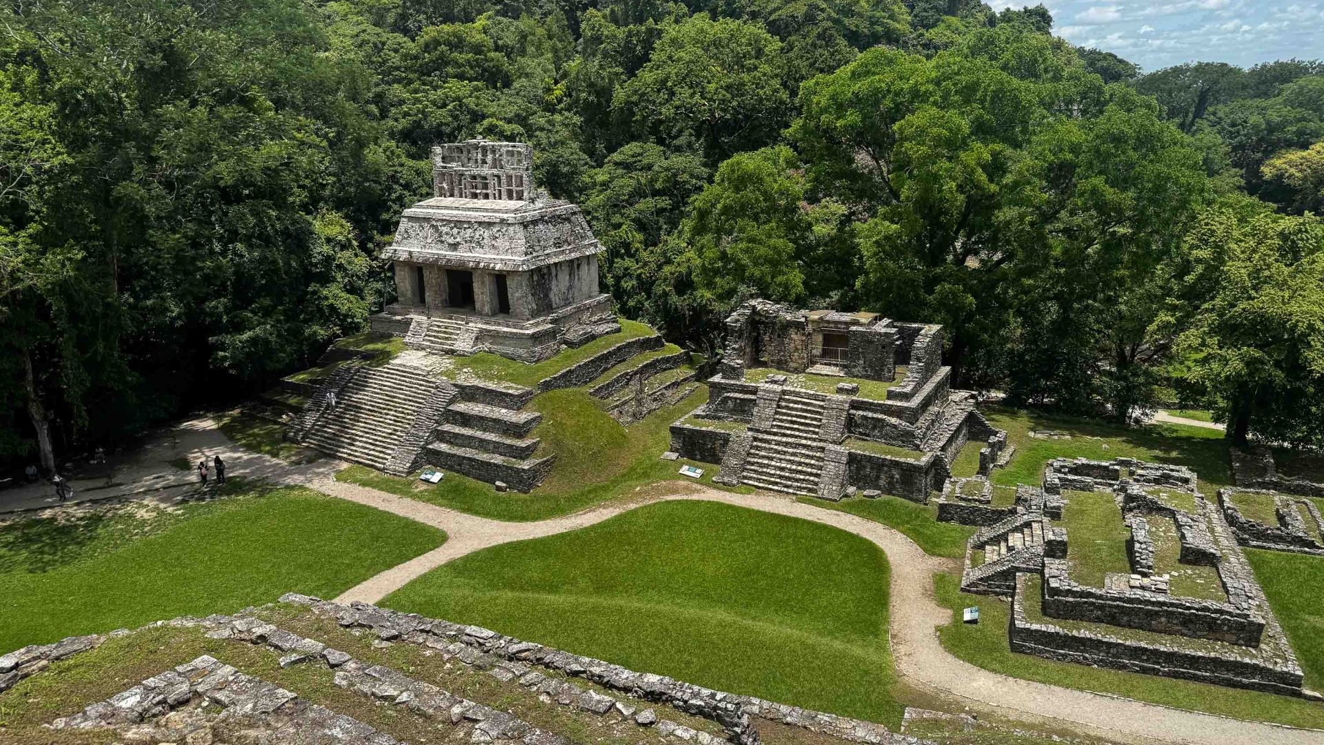 Ruins in a dense green jungle setting.