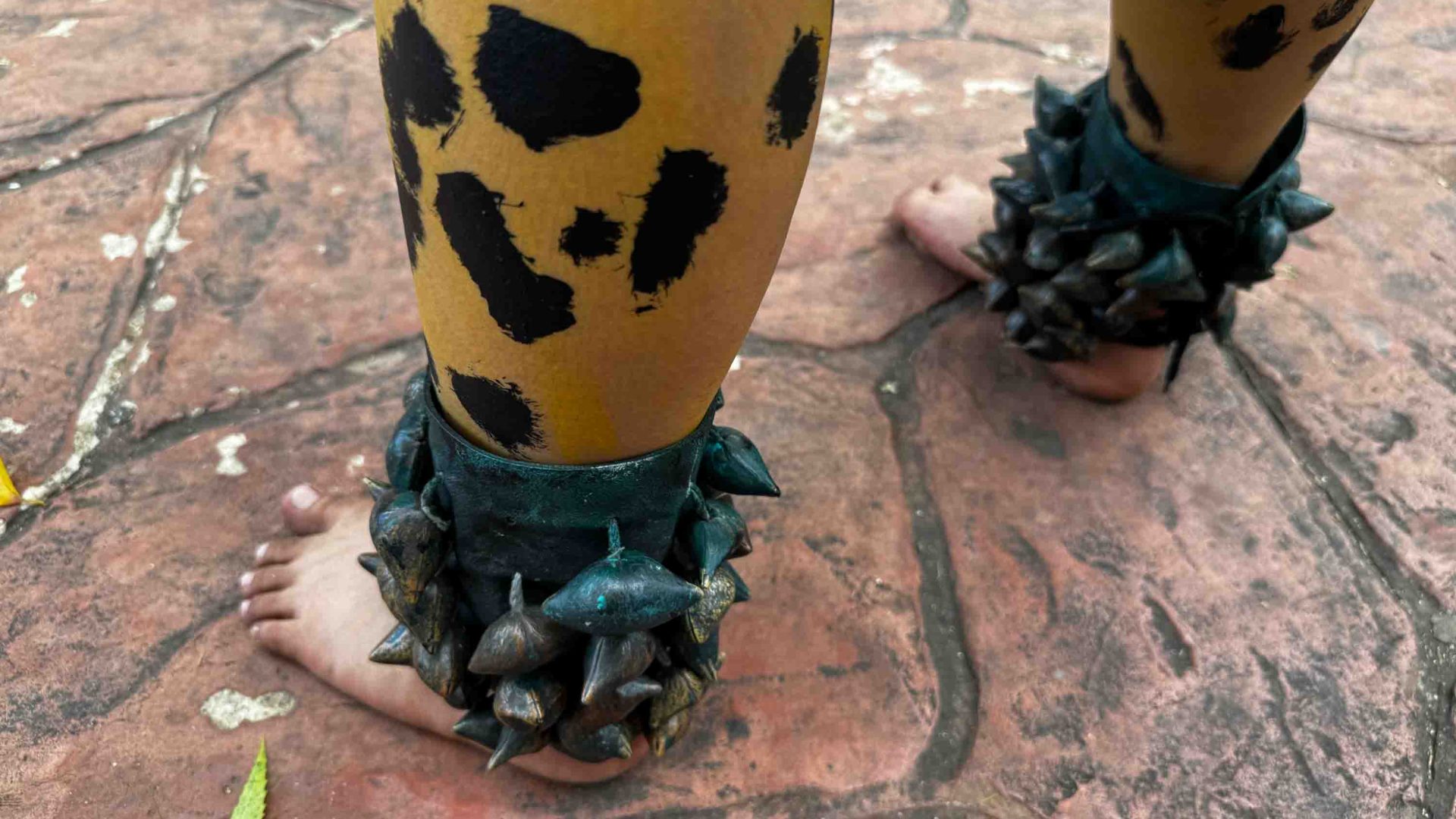The feet of a Mayan ceremony performer.