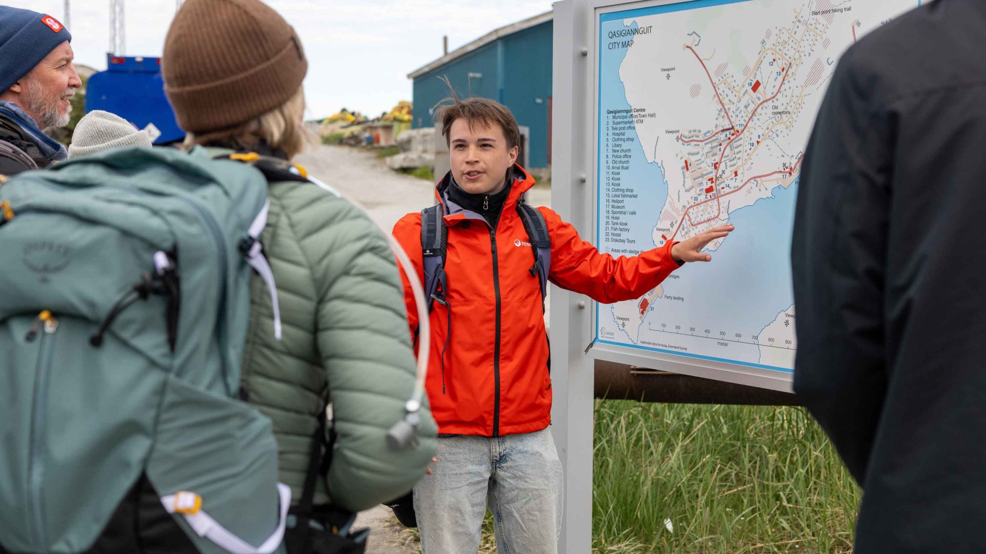 A man points out things on a map.
