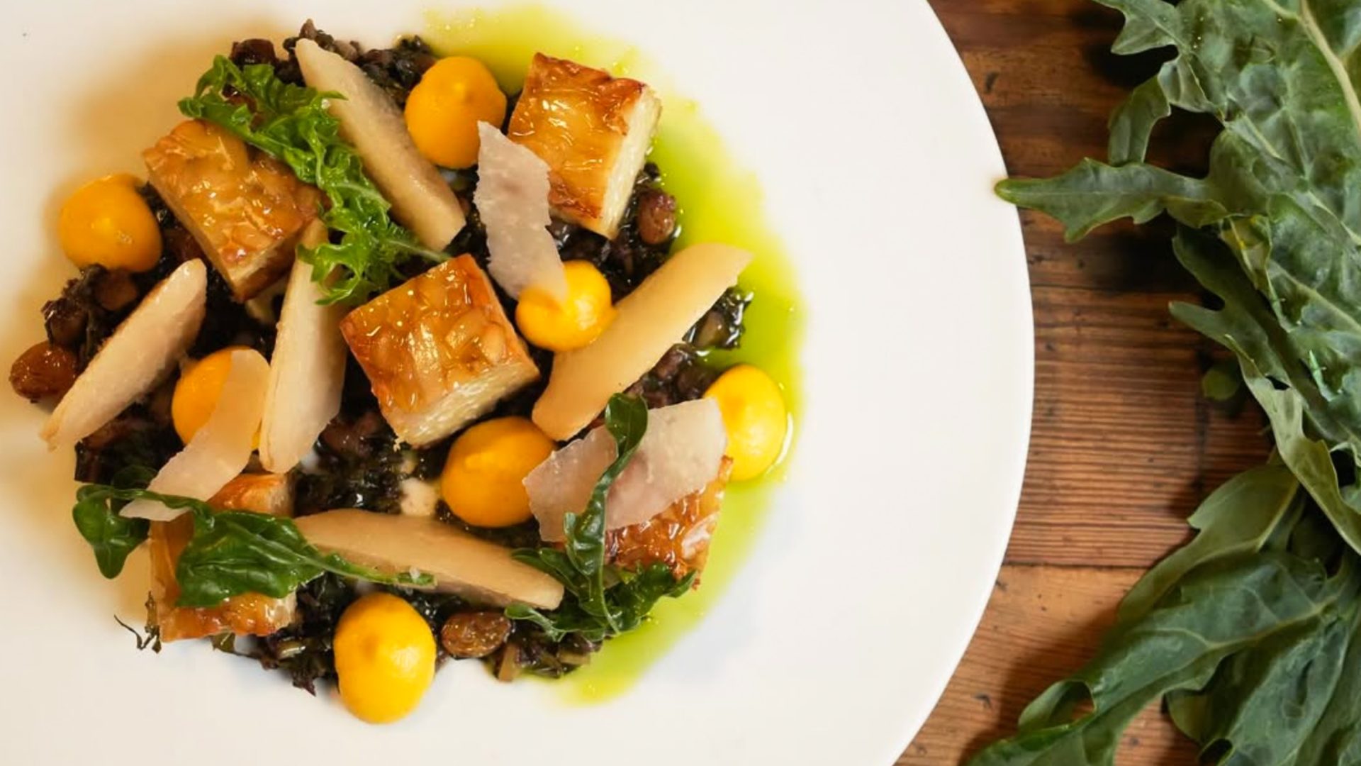 A plate of tempeh and other vegetables.