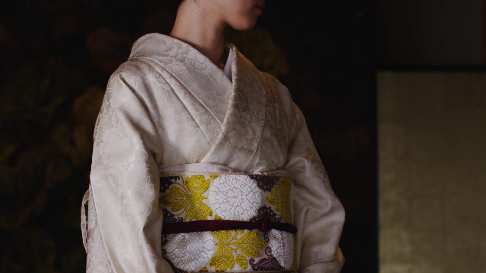 Woman wearing pale pink kimono
