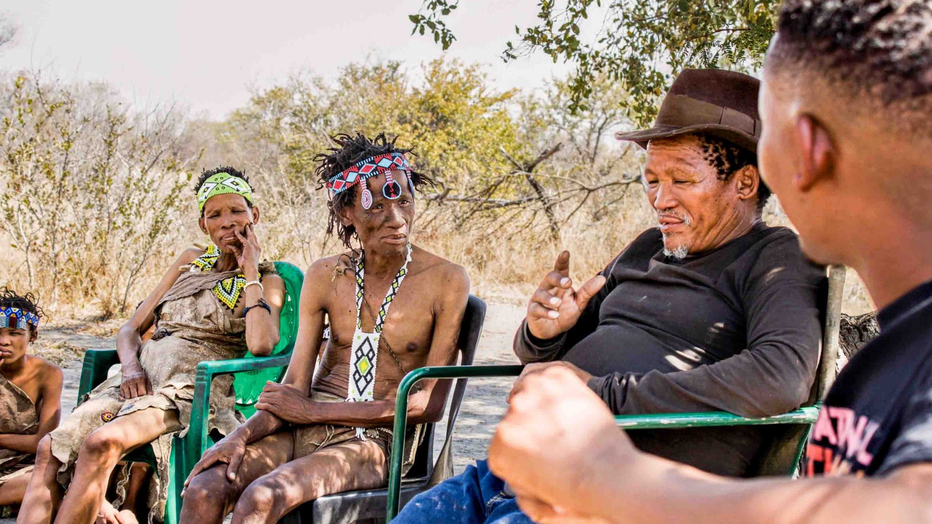 A man tells stories while others listen on.