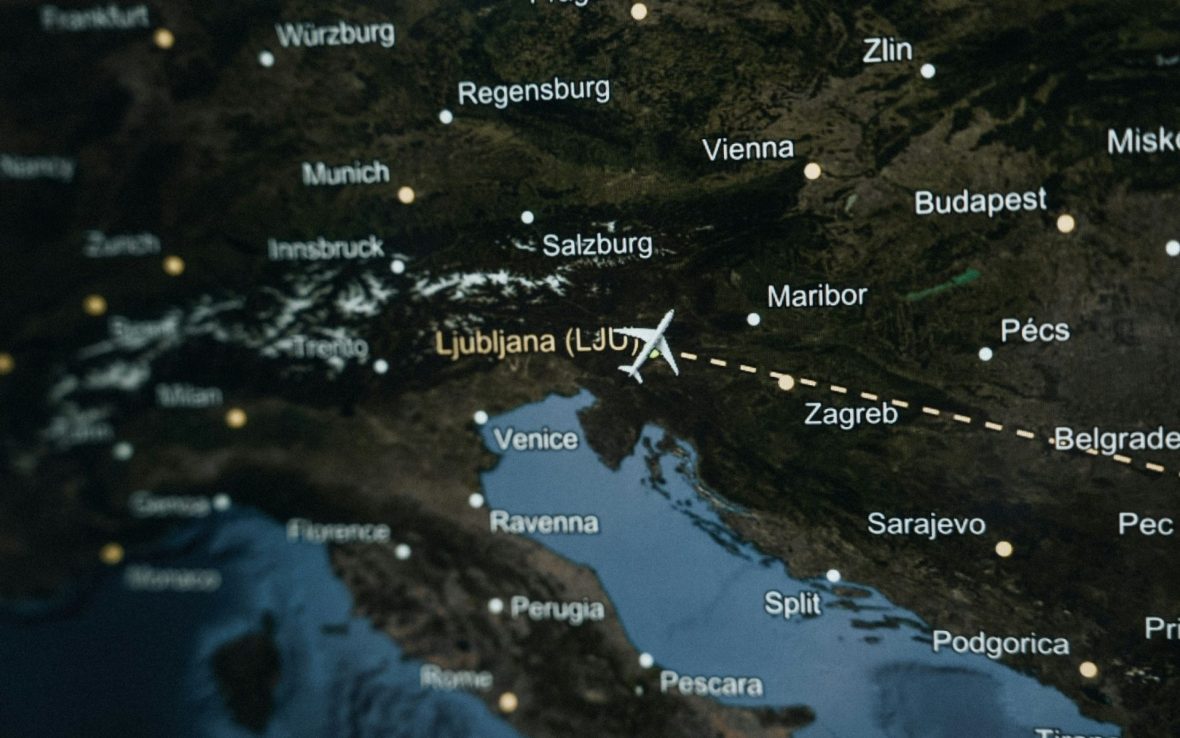A flight path map of southeastern Europe with a plane symbol