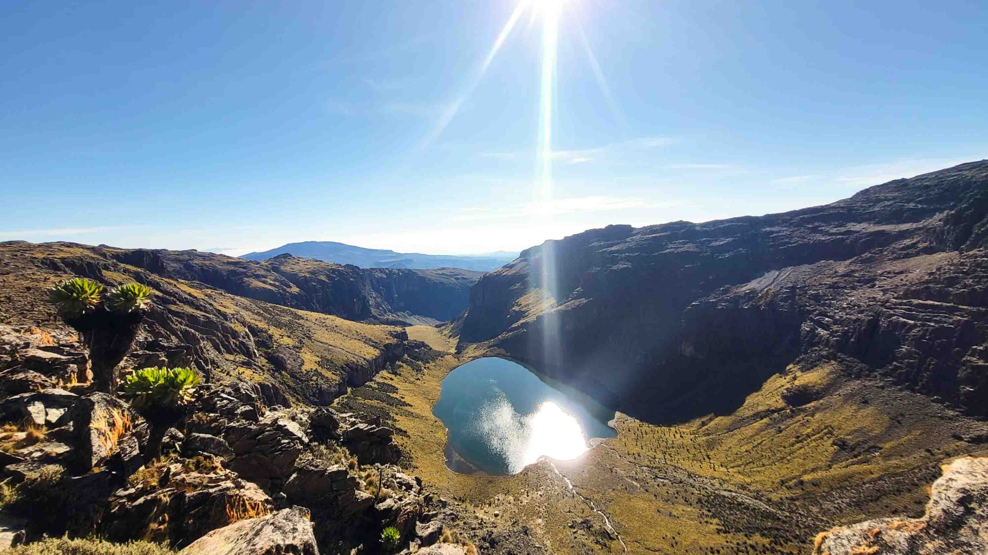 A view of mountains and a lake.