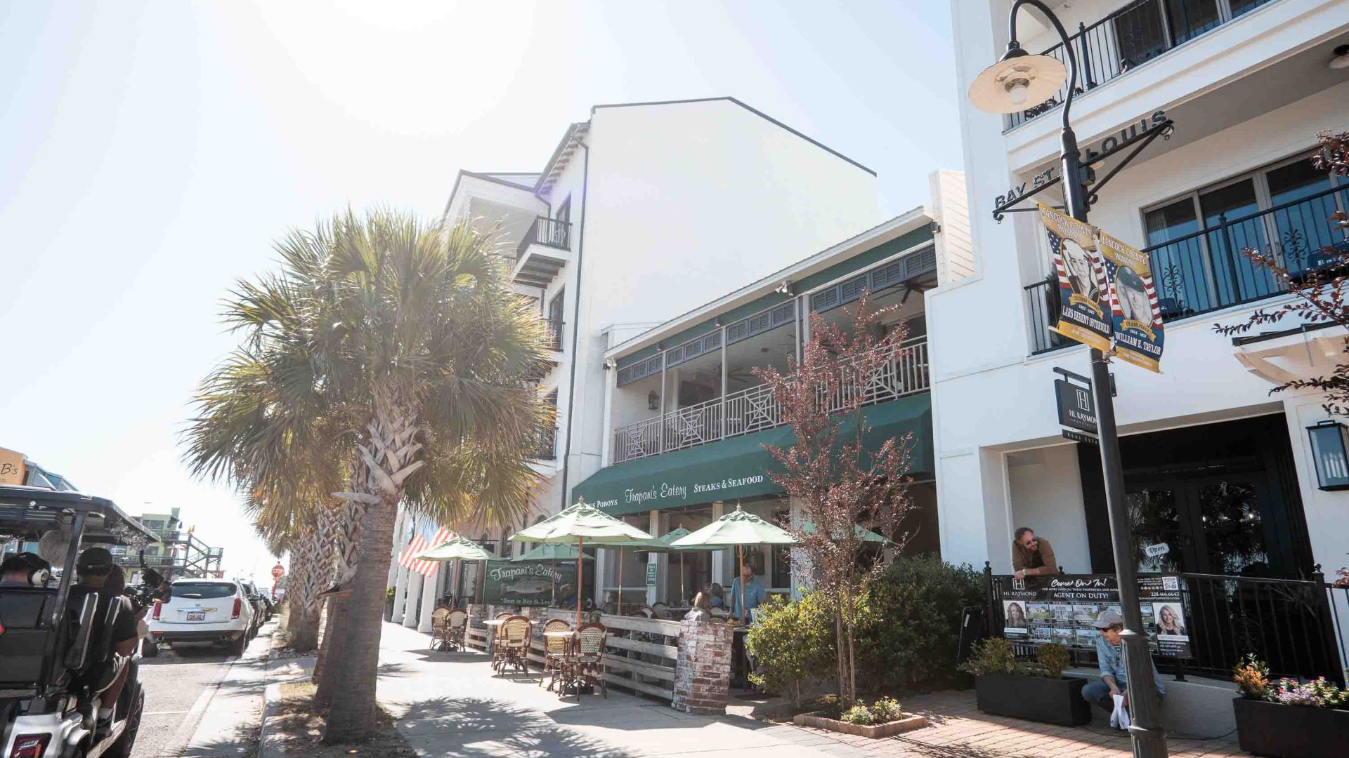 A street with cafes in it.