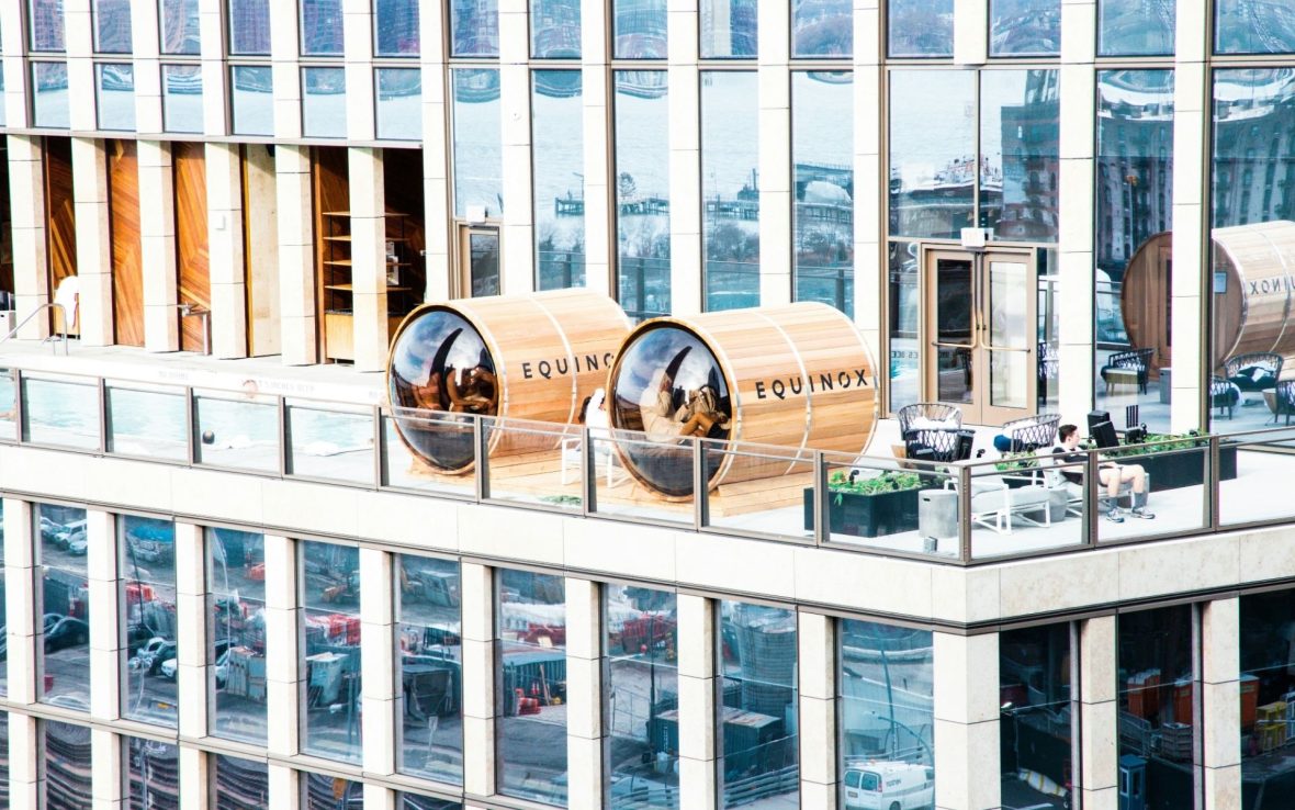 Aerial photo of sauna barrels on the patio at Equinox, Hudson Yards, in New York City.
