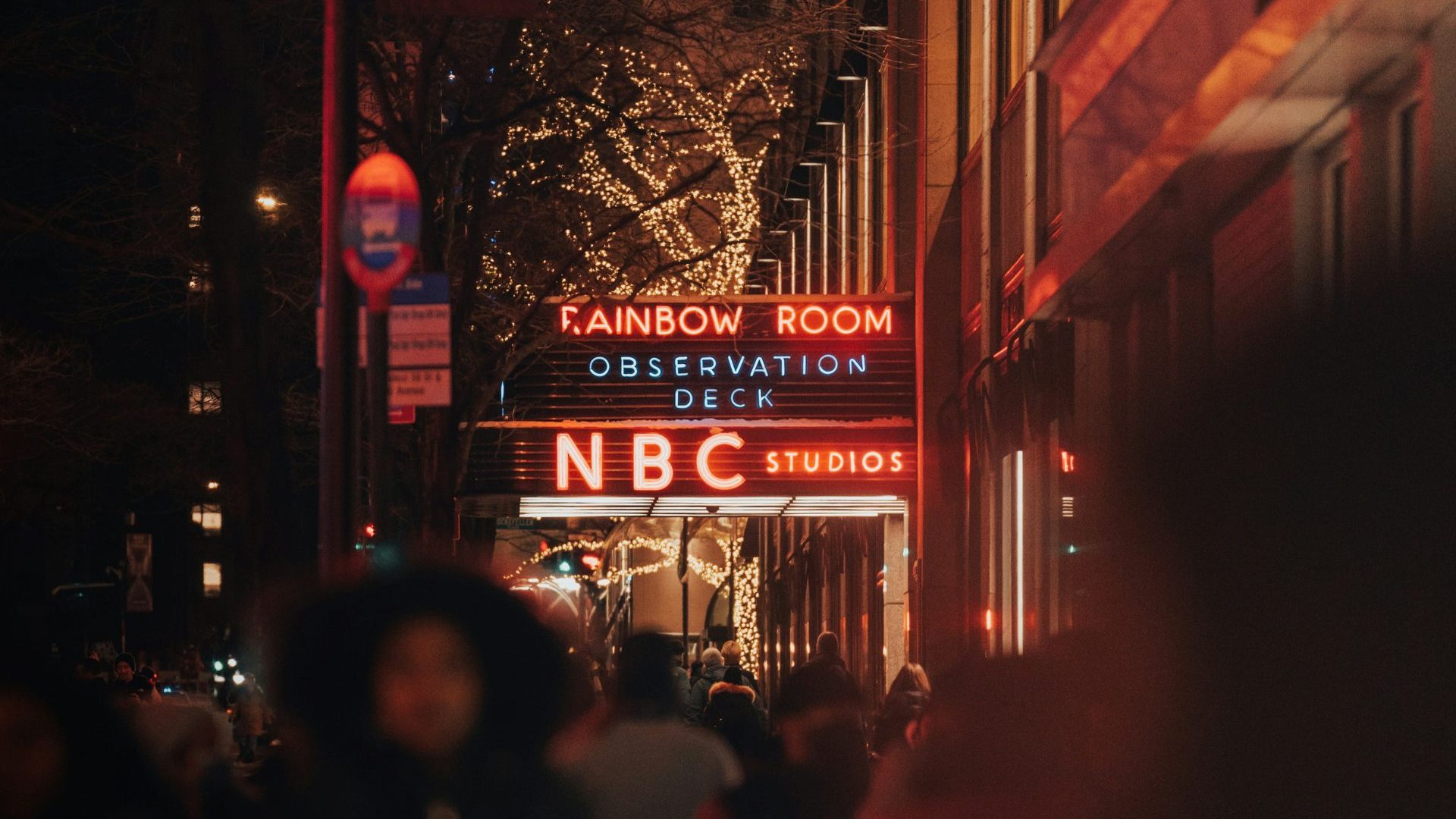 Neon sign lit up reading 'NBC Rainbow Room'