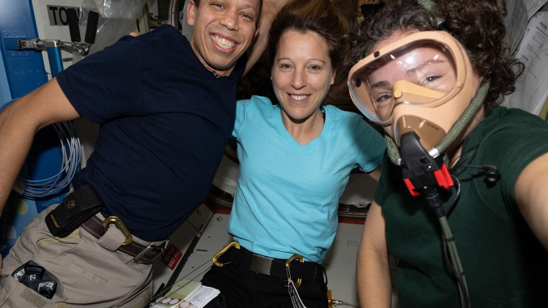 Expedition 74 flight engineers (from left) Chris Williams of NASA, Sophie Adenot of ESA (European Space Agency), and Jessica Meir of NASA pose for a portrait aboard the International Space Station
