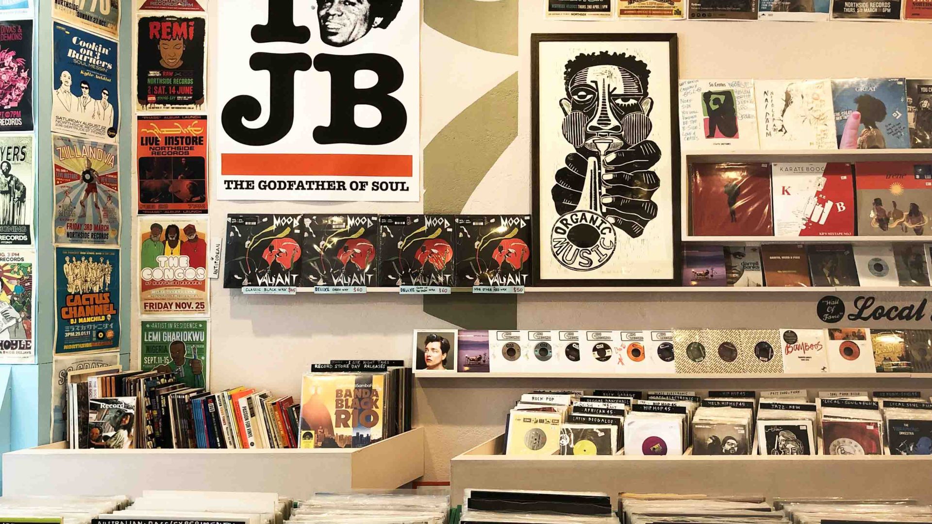 Posters and records in a store.