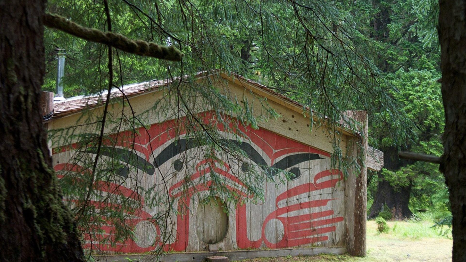 Red and black painted wooden building