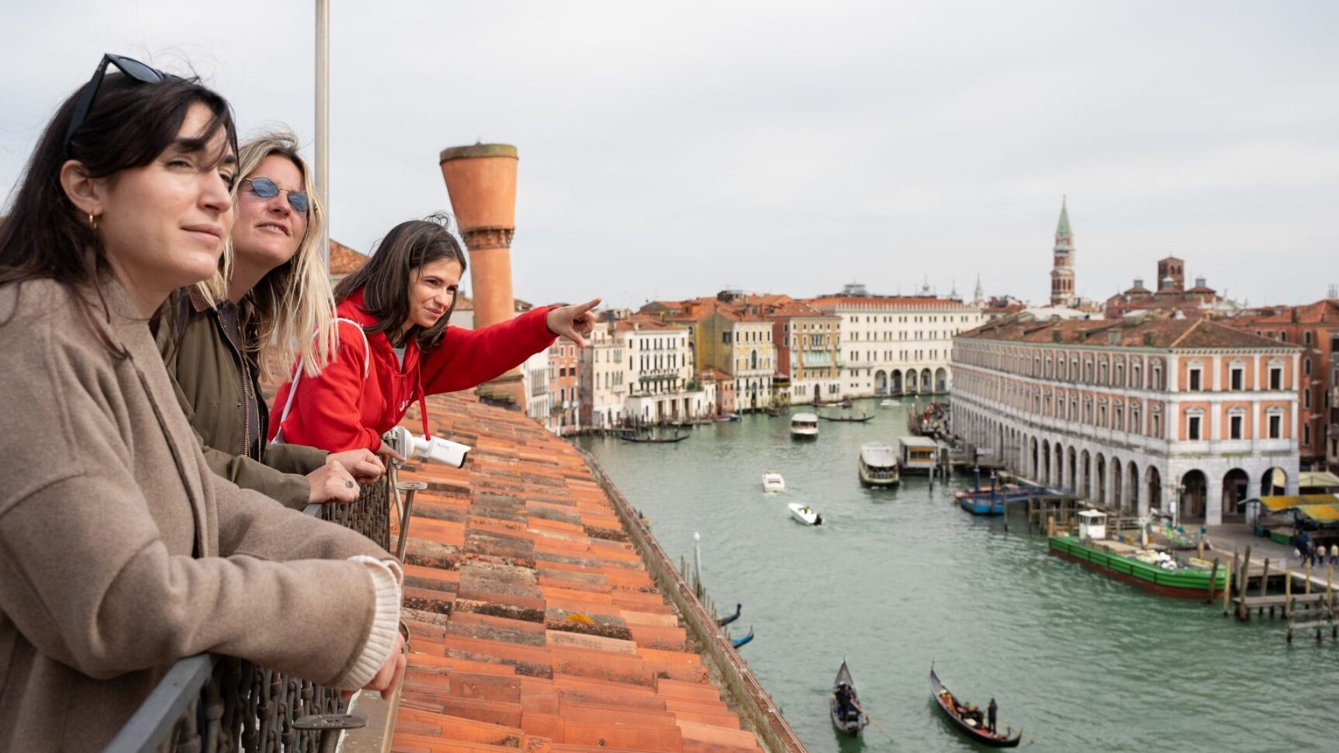 Group overlooks green canal