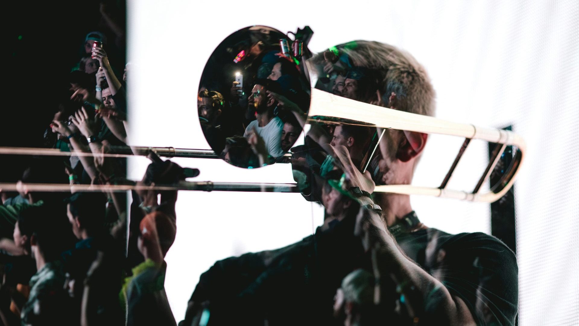Man plays trumpet.