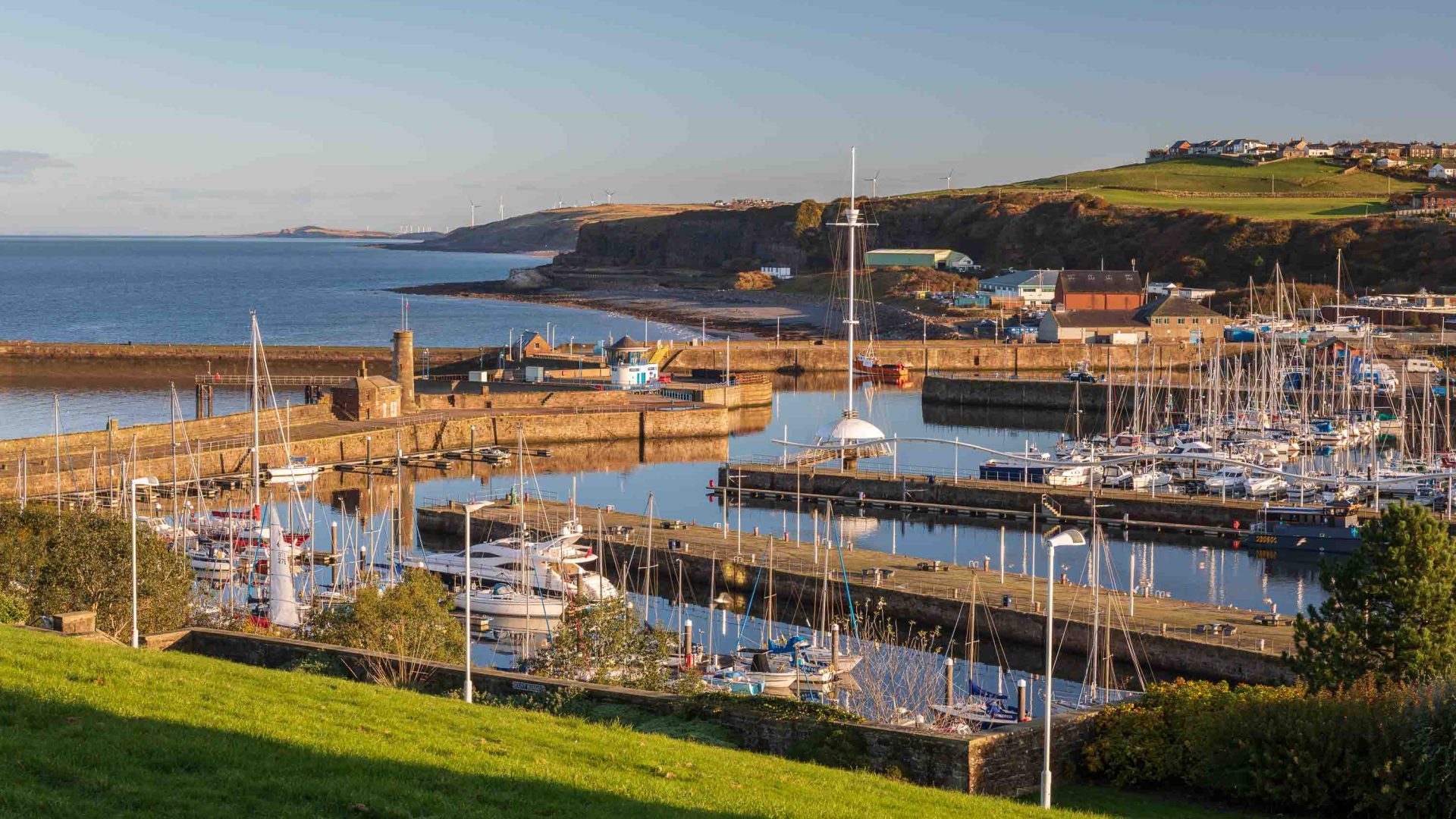 Boats in a harbour in soft light.