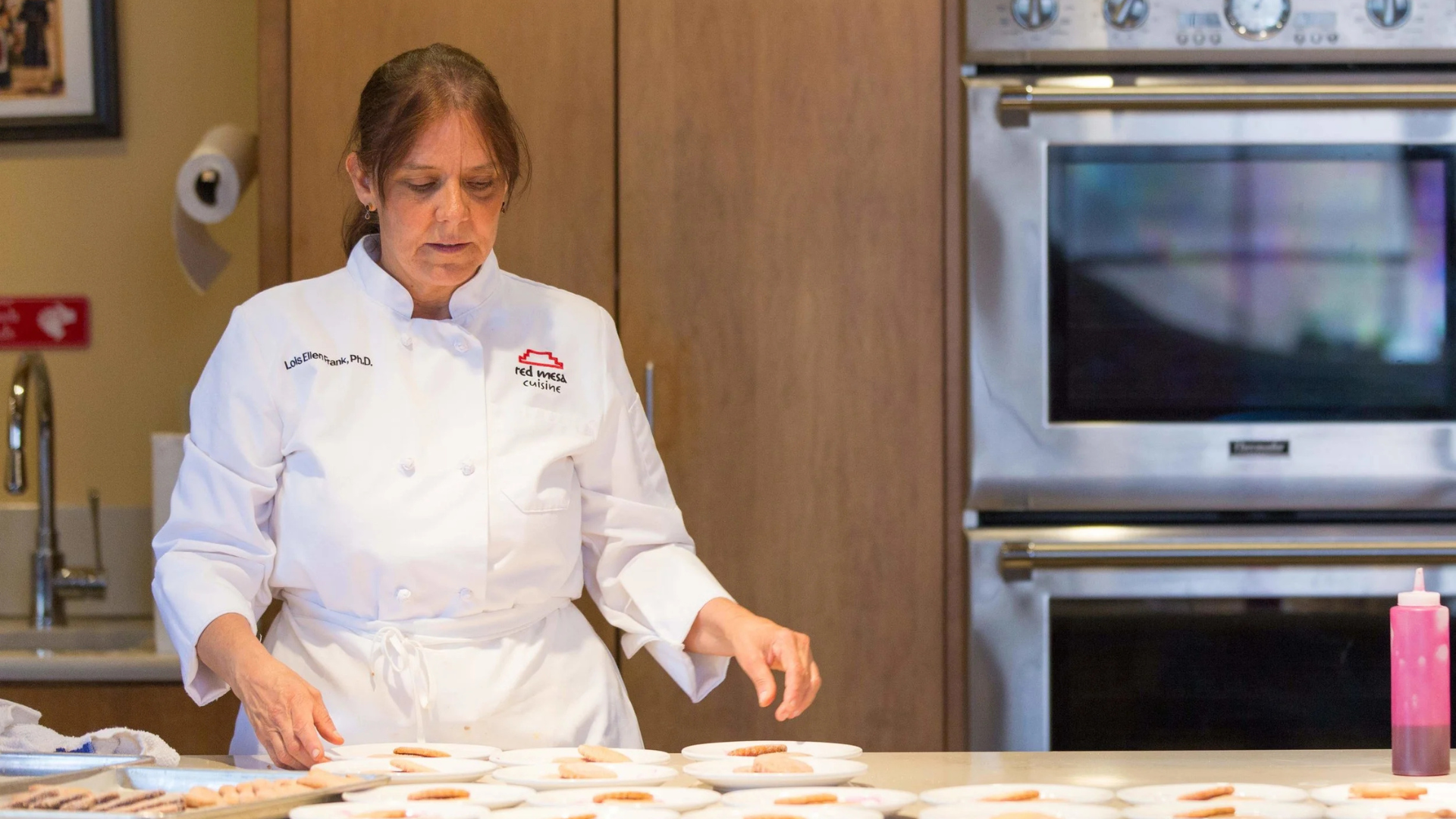 Woman in white chef uniform