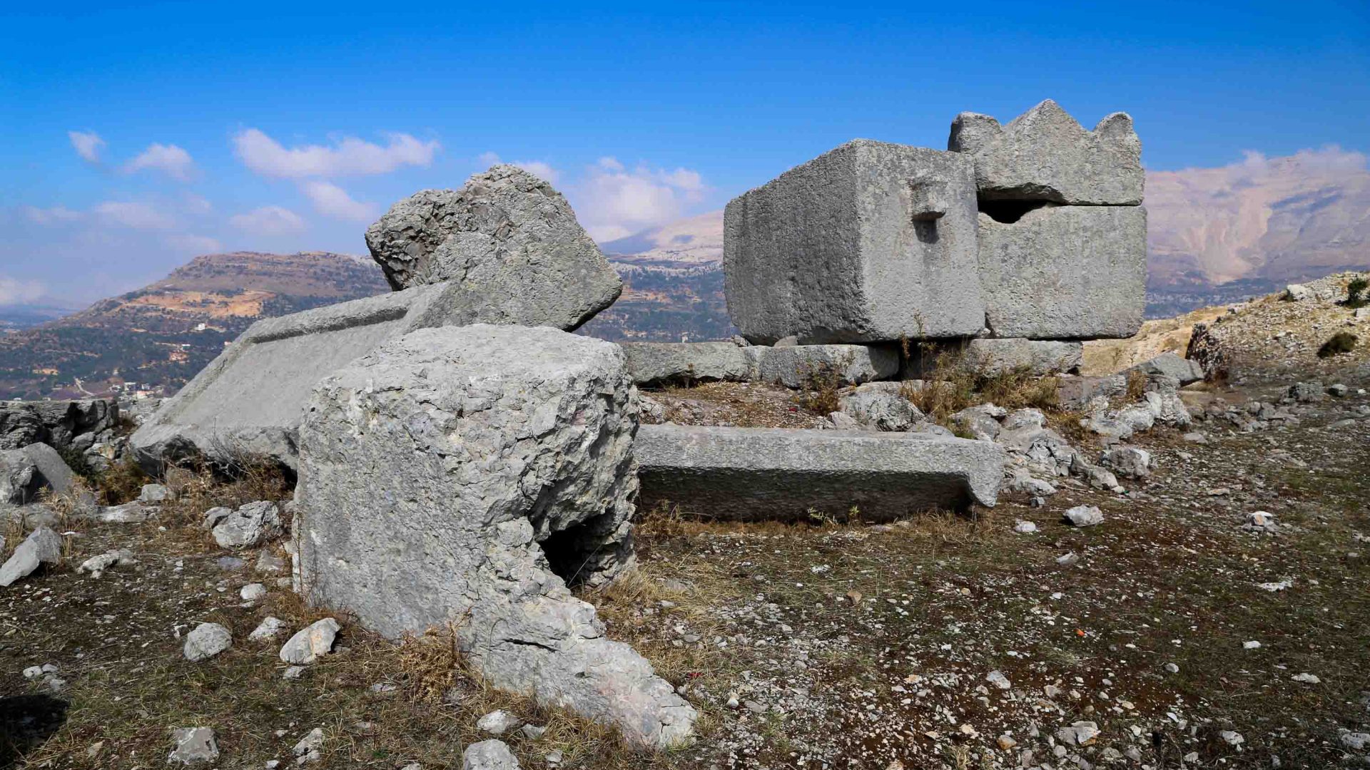 Ruins of a structure on top of a hill.